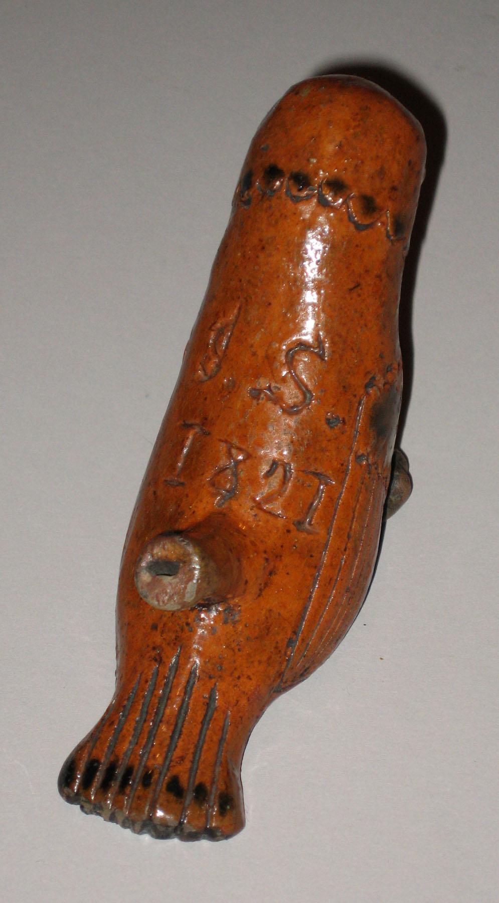 1960.0639 Redware 1821 bird whistle (back)