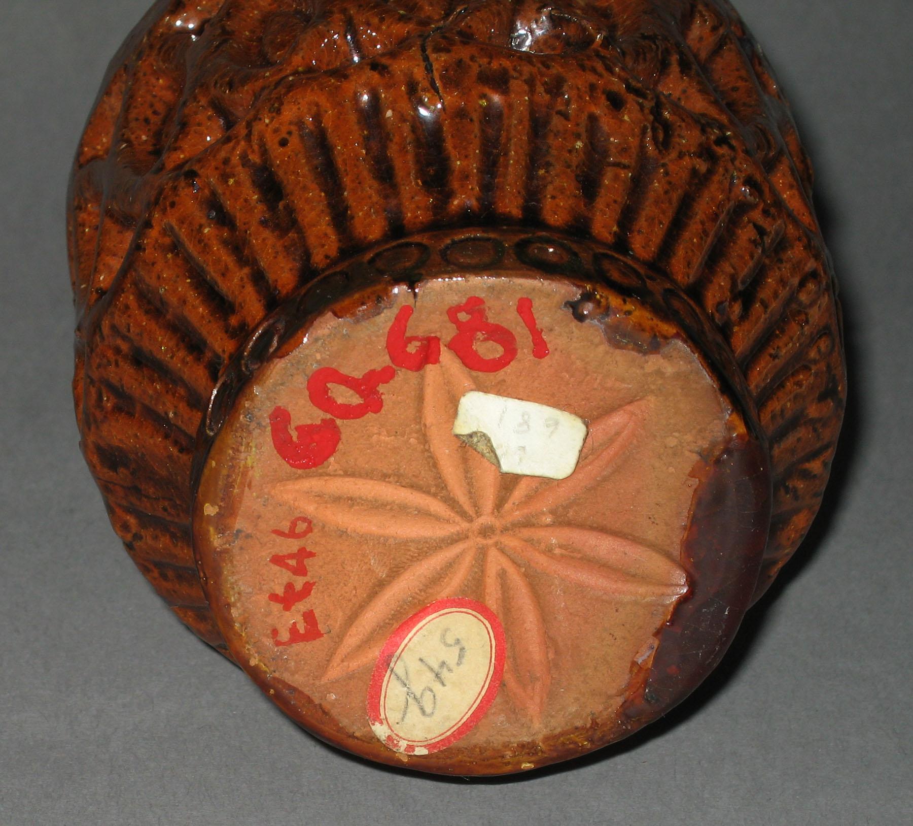 1960.0681 Redware bank (bottom)