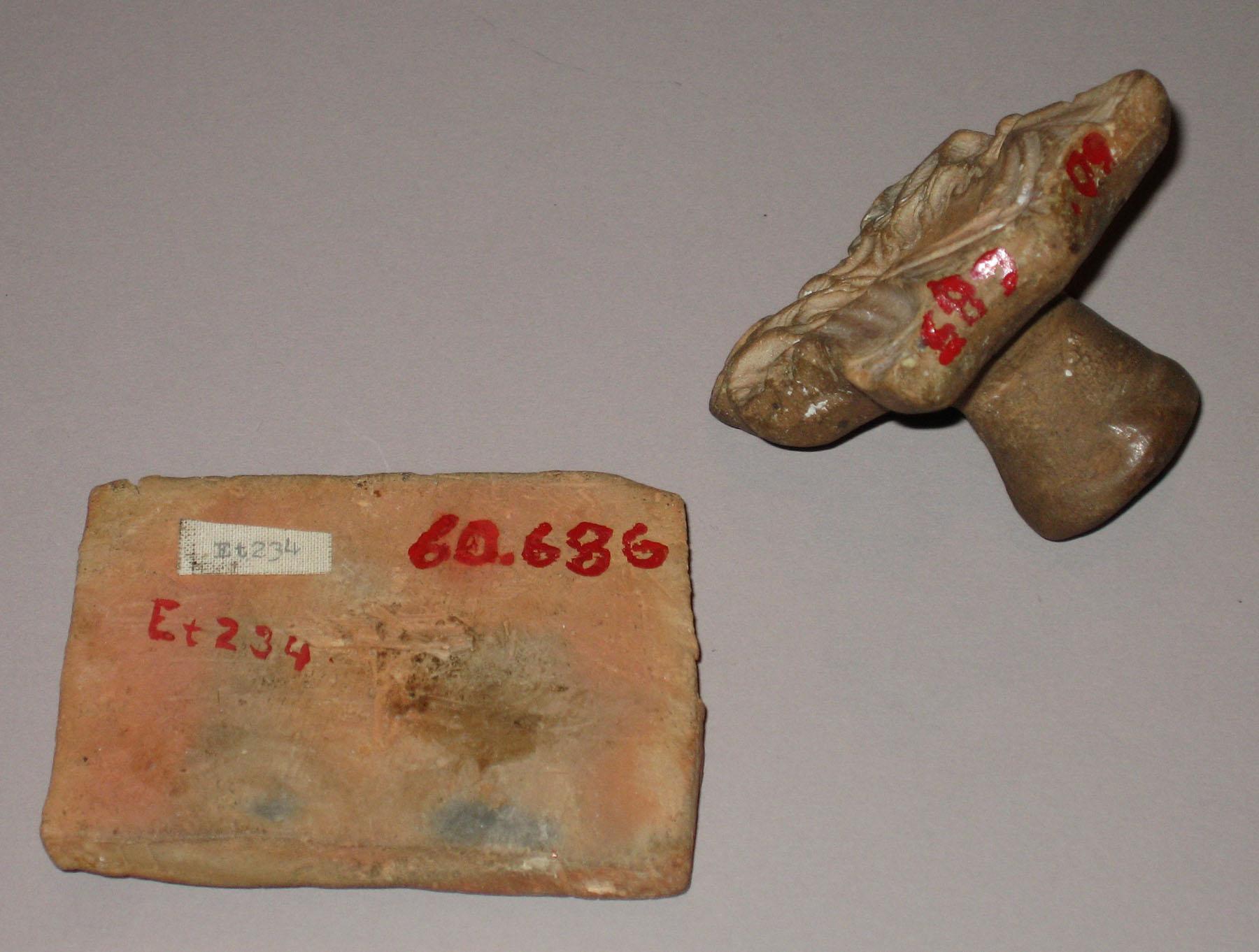 1960.0686; 1960.0685 Redware face molds (side 2)
