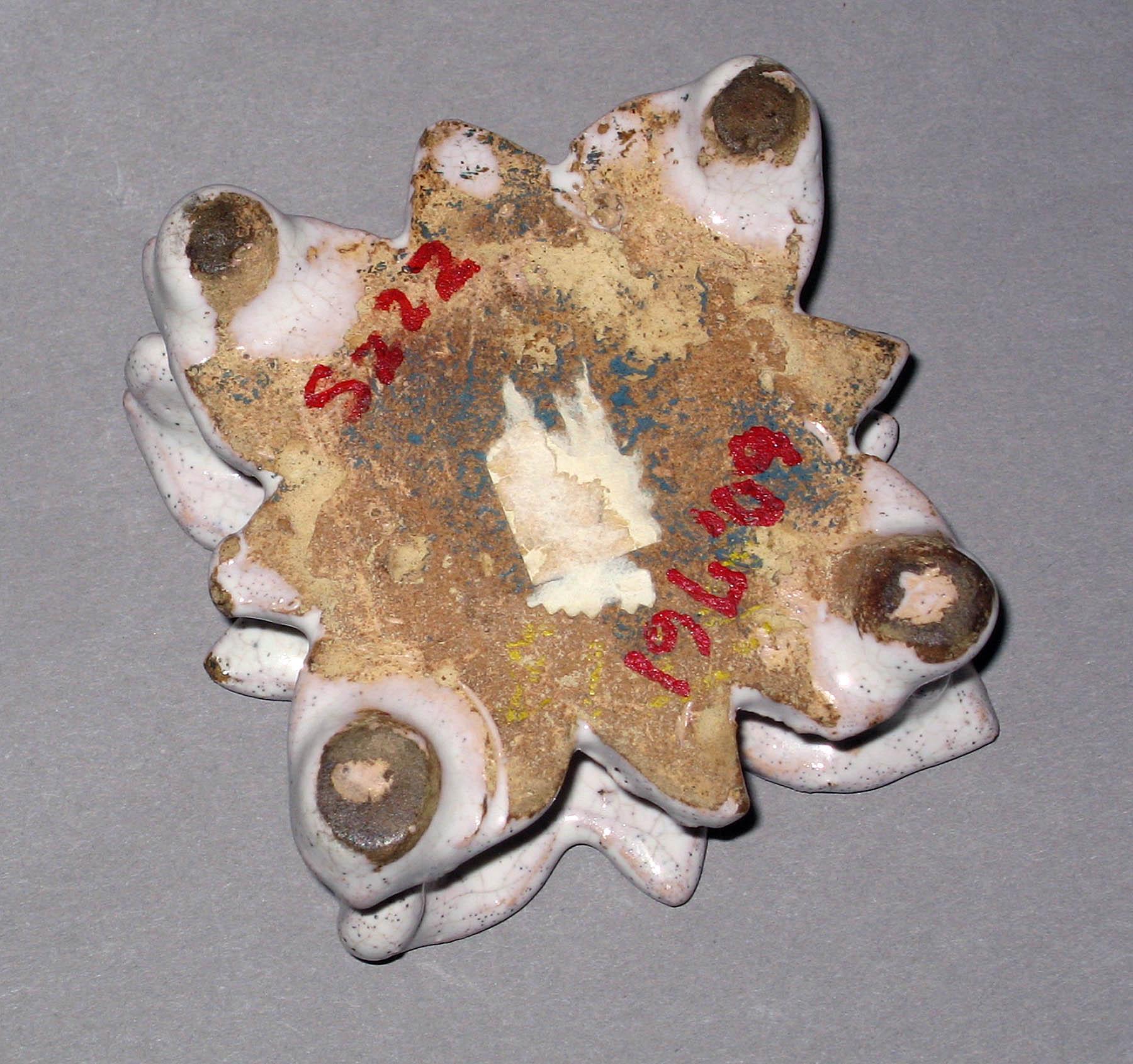 1960.0761 Earthenware salt (underside)