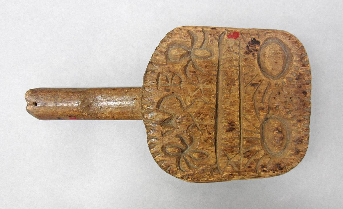 1960.0984, Butter mold, side 1