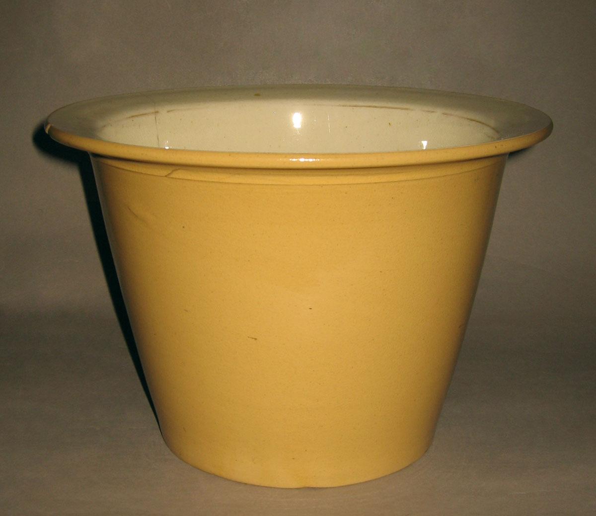 1960.1030 A Creamware chamber pot