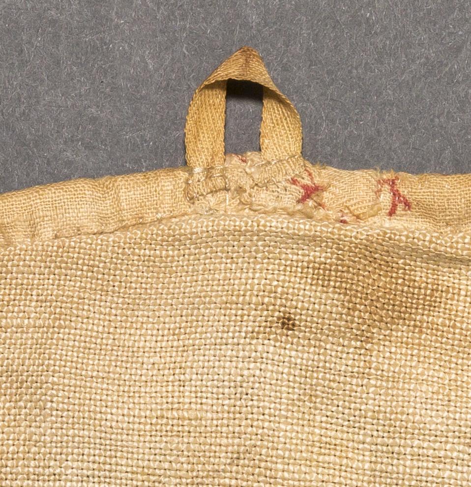 1960.1111 Pot holder, reverse, detail 1