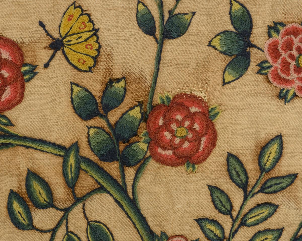 1960.1123 Bag, detail, before conservation treatment