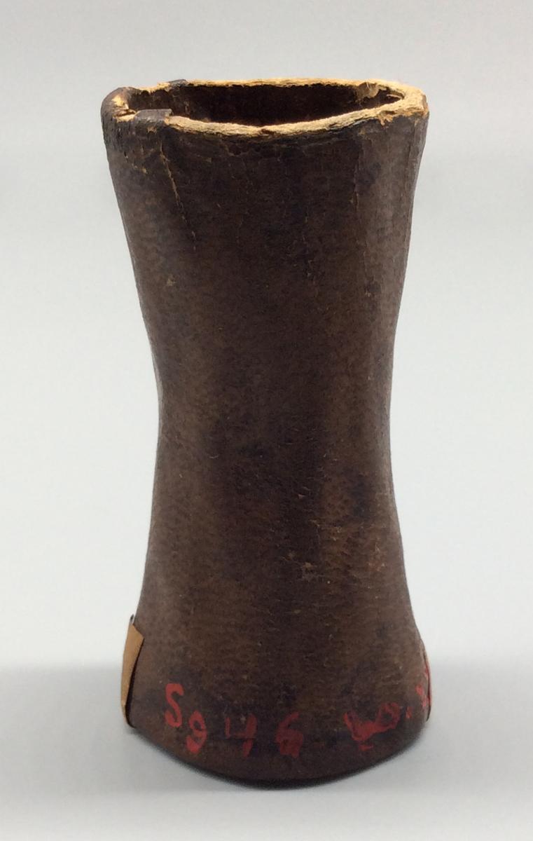 1960.1135 A Dice cup, view 1