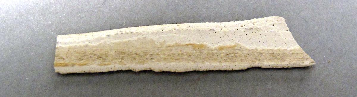 1960.1144 A Sewing box broken piece 1 underside