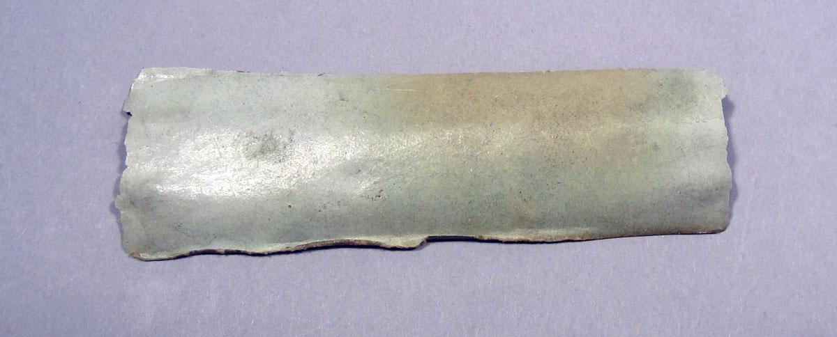 1960.1144 A Sewing box broken piece 2 upper surface