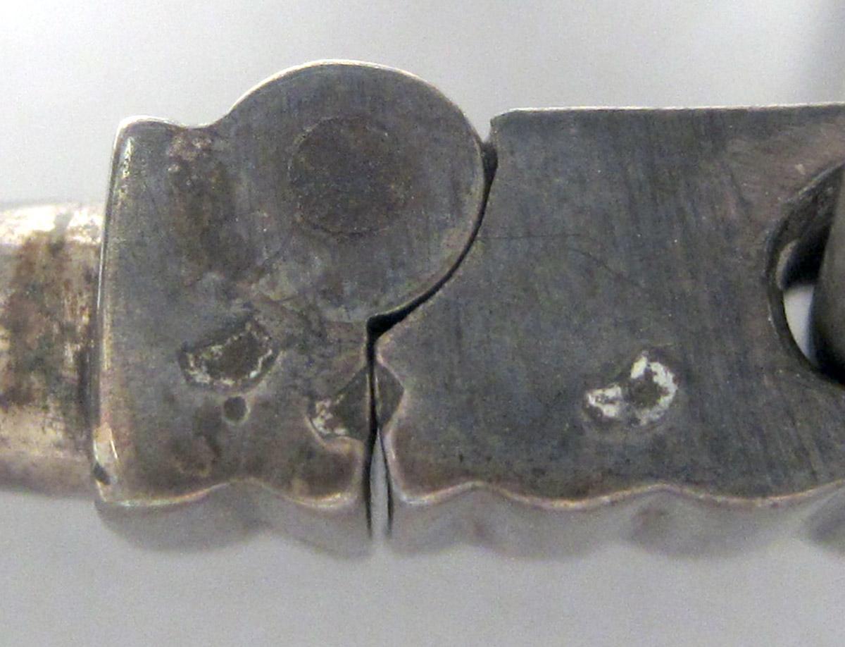 1961.0008 Silver and Glass Magnifying glass possible marks 2 and 3