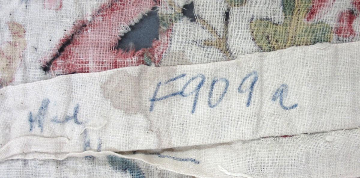 1961.0026.001 Textile, printed inscription