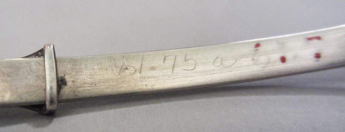 1961.0075 A Spectacles, inscription