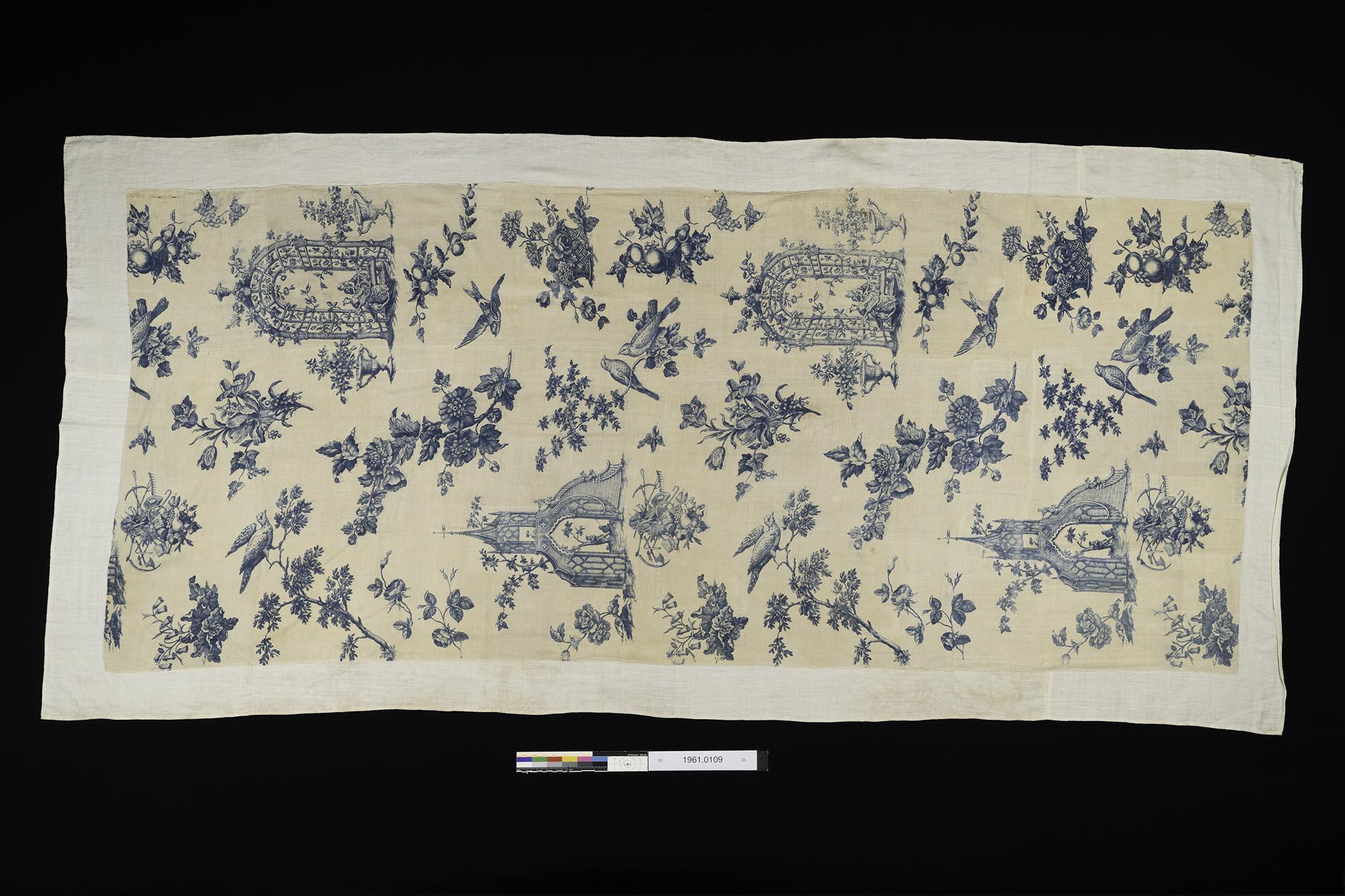 1961.0109 A Textile, printed, overall with color card