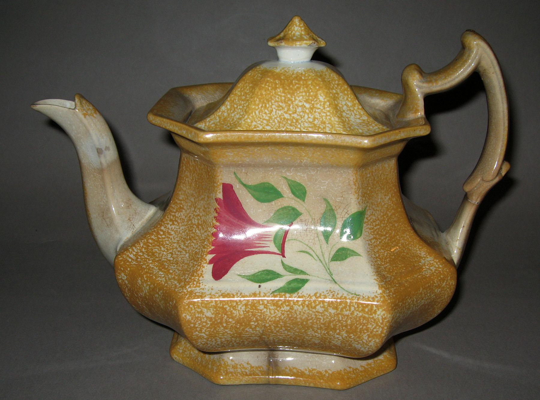 1961.0163 A, B Thistle pattern spatterware teapot