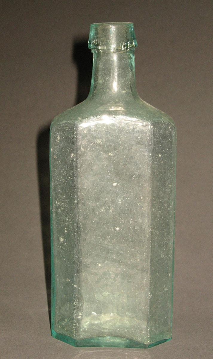 1961.0205.001 Glass syrup bottle (front)