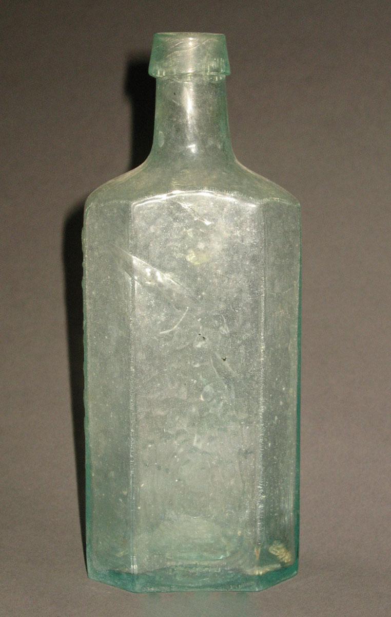 1961.0205.002 Glass syrup bottle