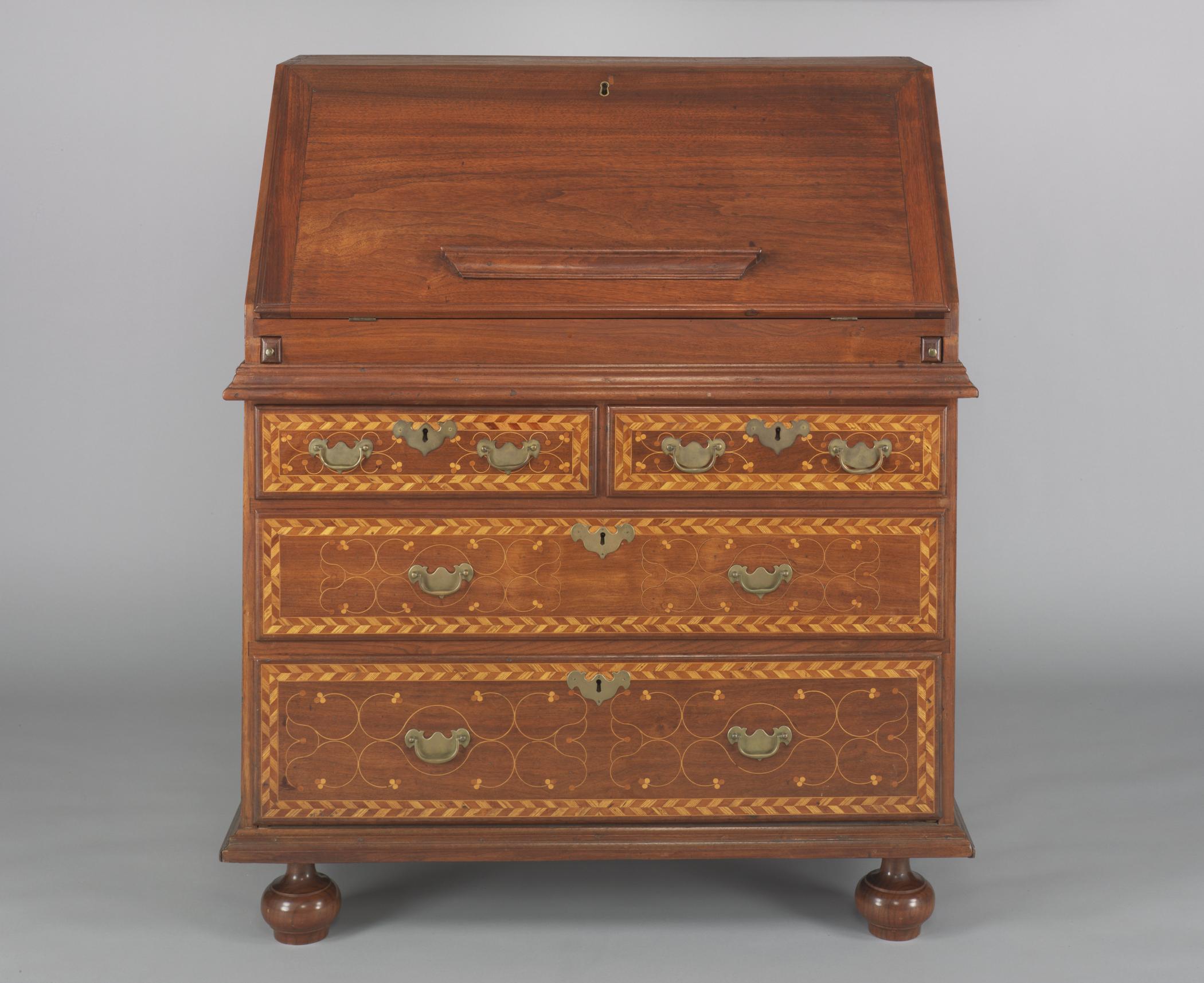 1961.0278 Desk, view 2, before conservation treatment, feet