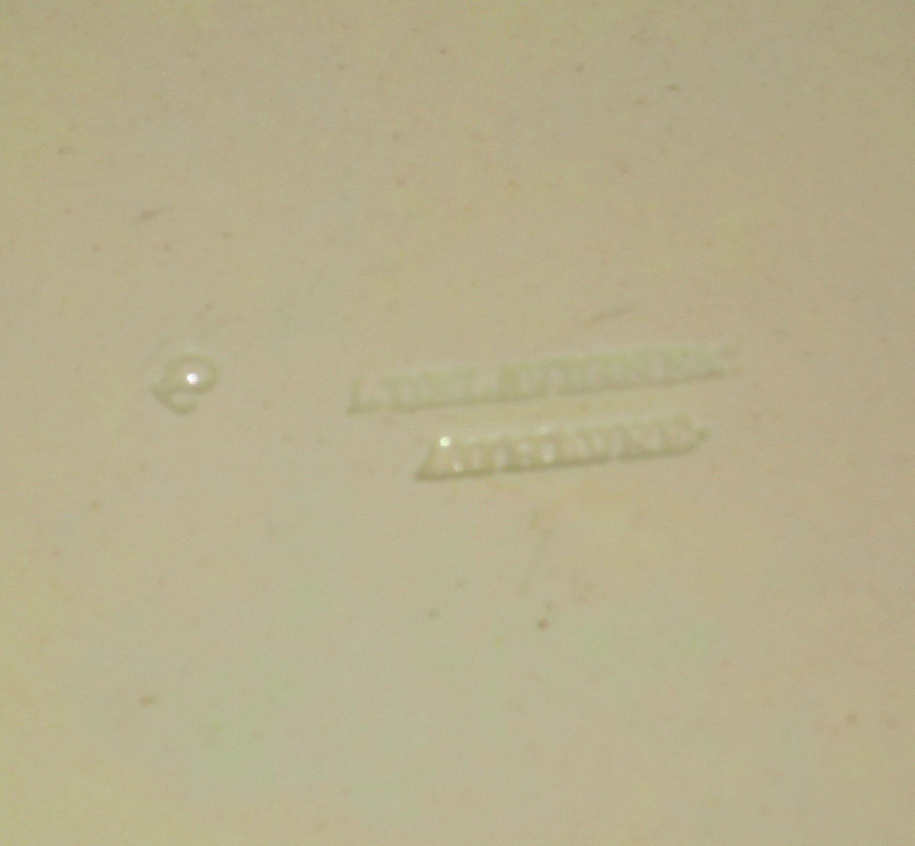 1961.0312 French creamware plate (mark)