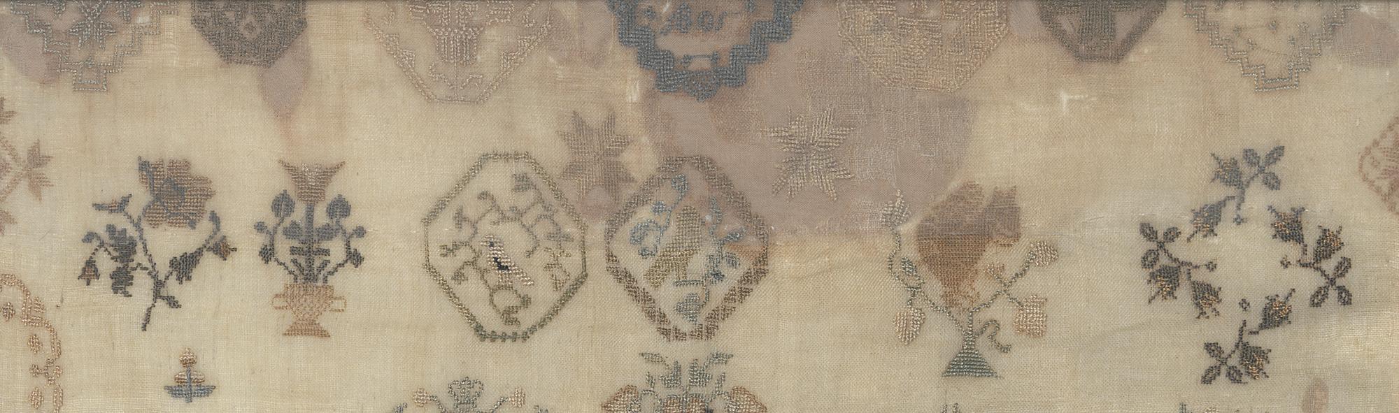 1961.0348 A Sampler, Detail 8