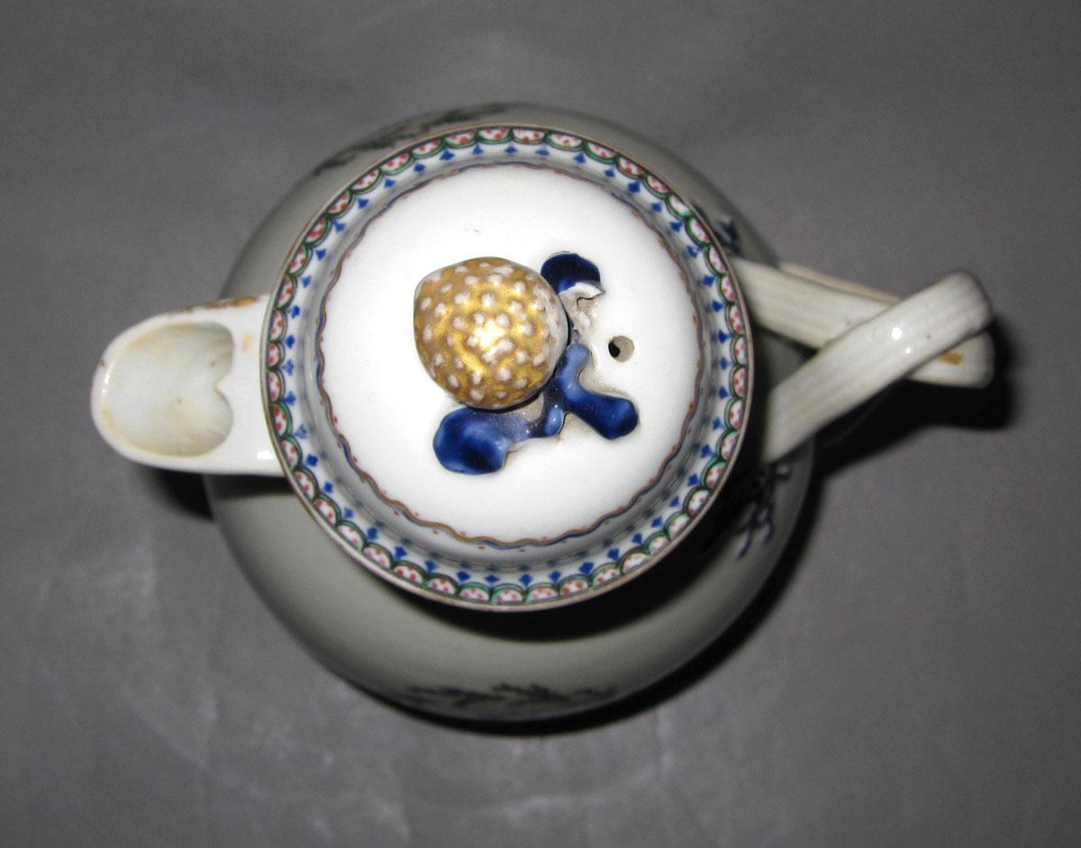 1961.0384 A,B Porcelain ewer top