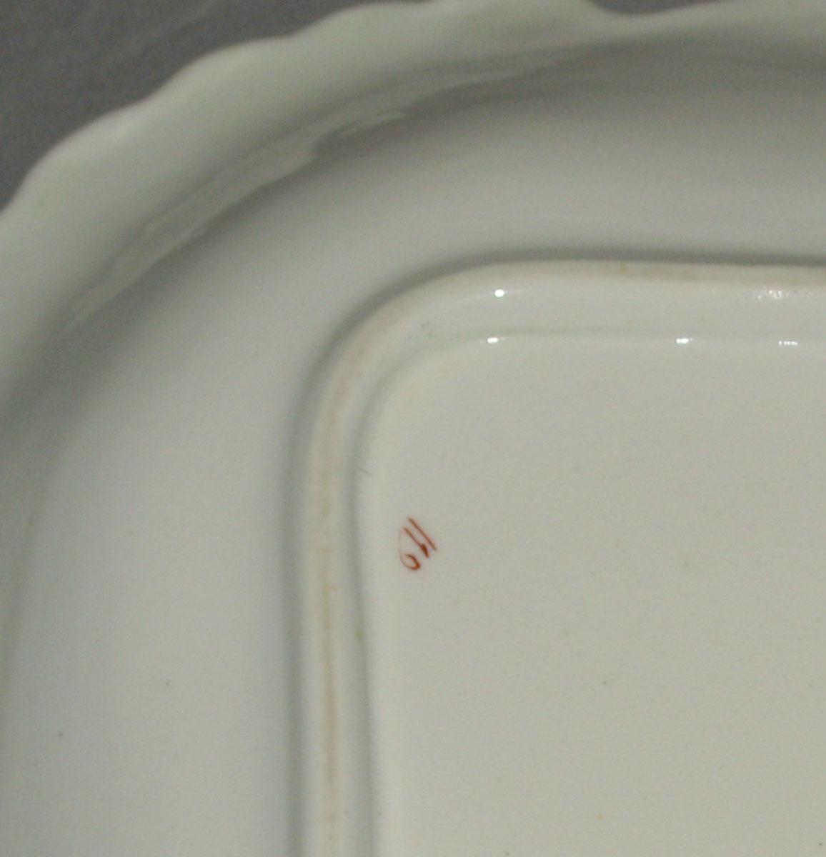 1961.0386.004 Bone china dish (detail of underside)