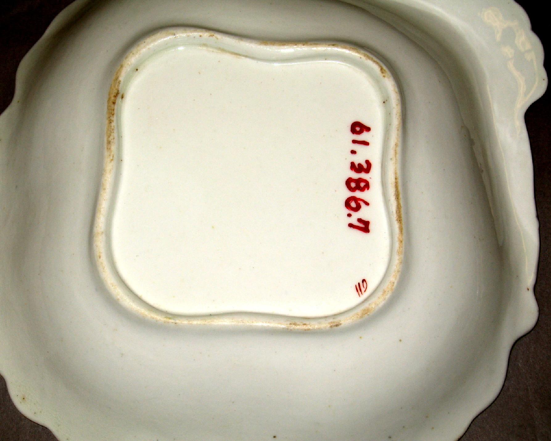 1961.0386.007 Bone-china dish (underside)
