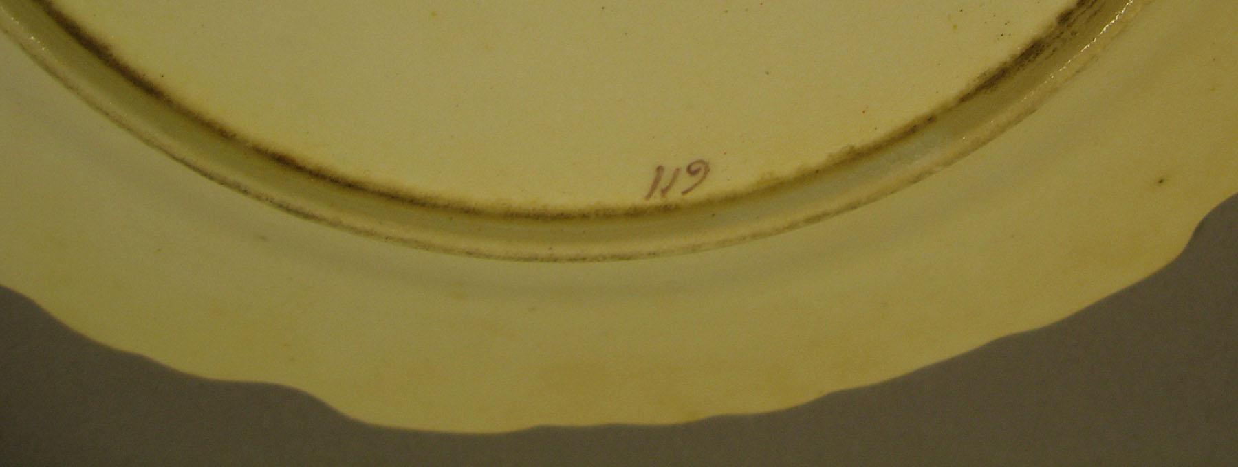 1961.0386.019 Plate (mark)