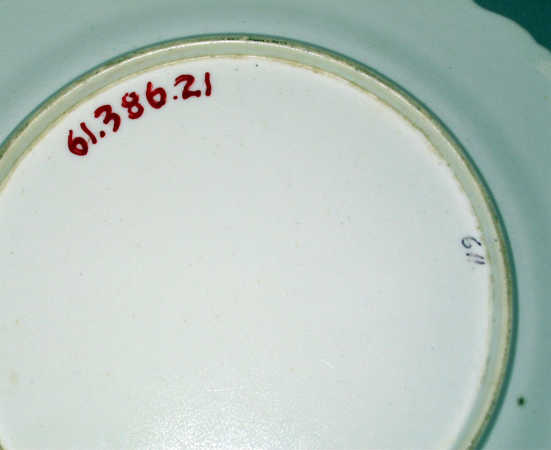 1961.0386.021 Bone-china plate (underside)