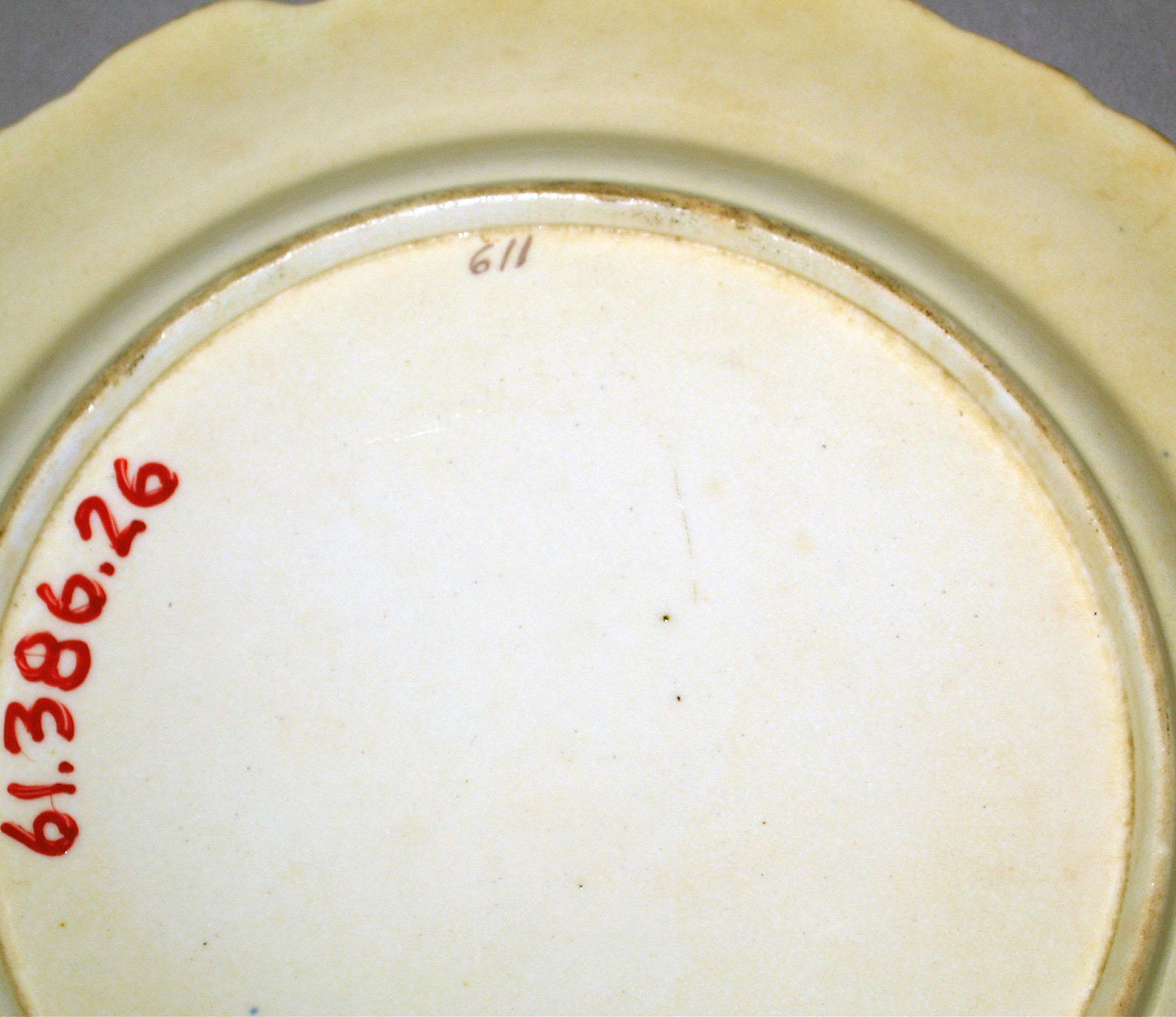 1961.0386.026 Bone-china plate (underside)