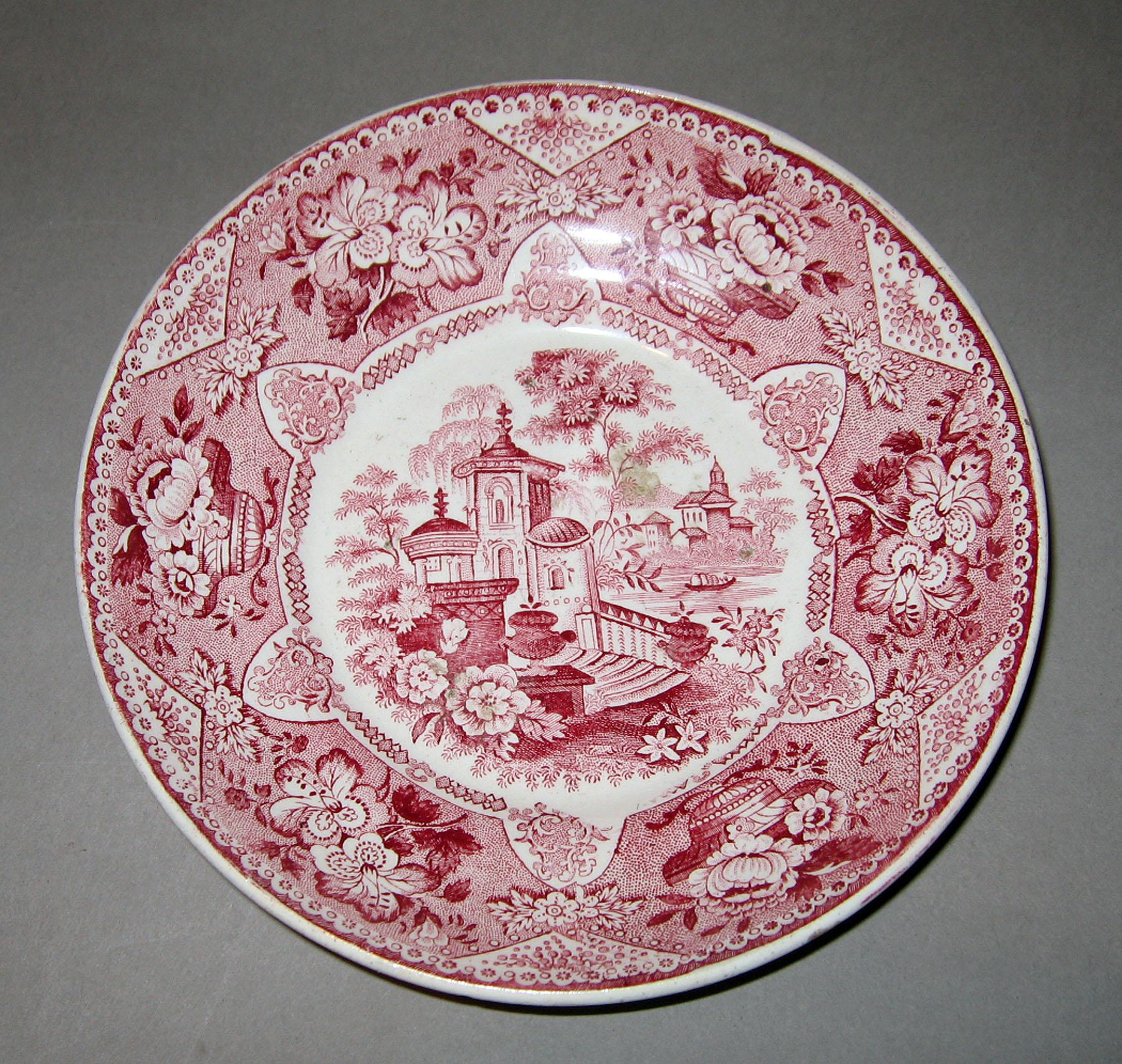 1961.0445.001 Earthenware saucer