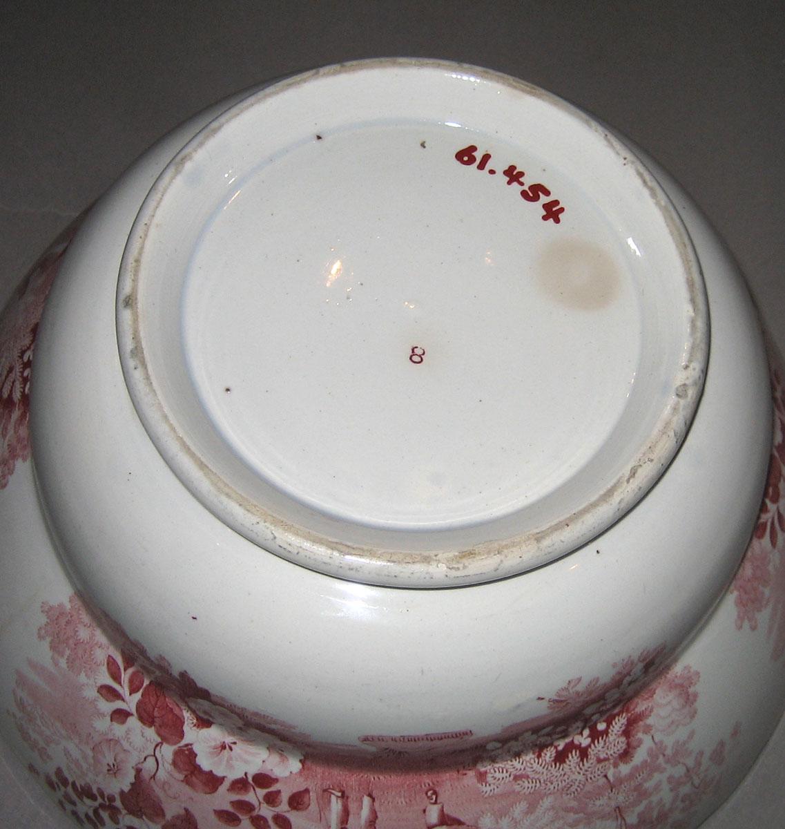 1961.0454 Archery pattern red printed bowl (mark)