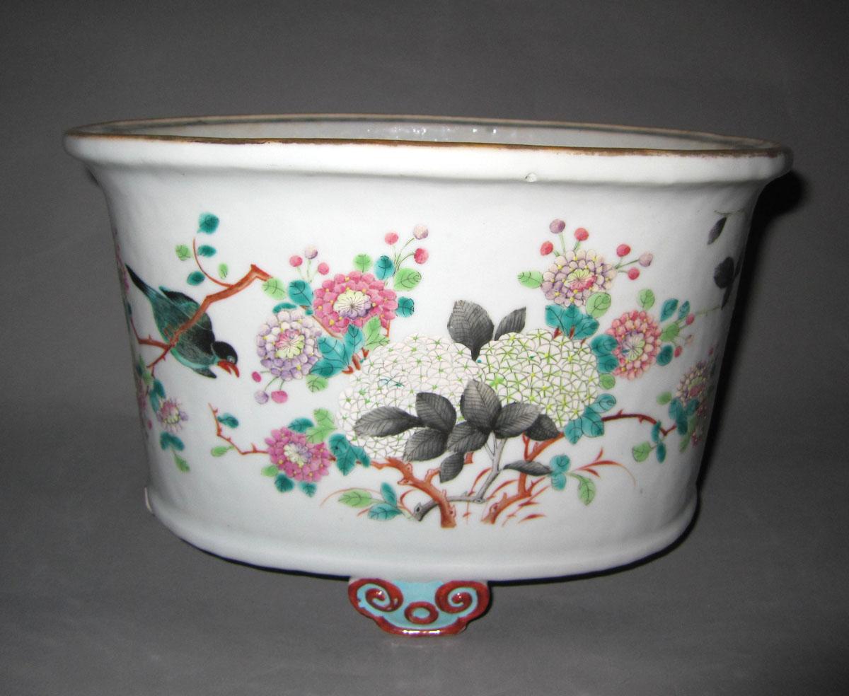 1961.0470.002 Porcelain flower pot face three