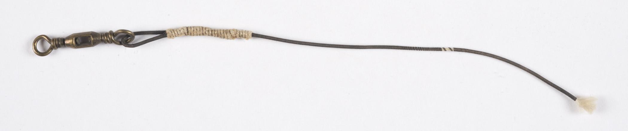 1961.0492 Fishing tackle kit, unmarked object in kit