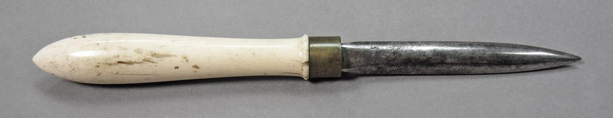 1961.0493.018, Burnisher, side 1