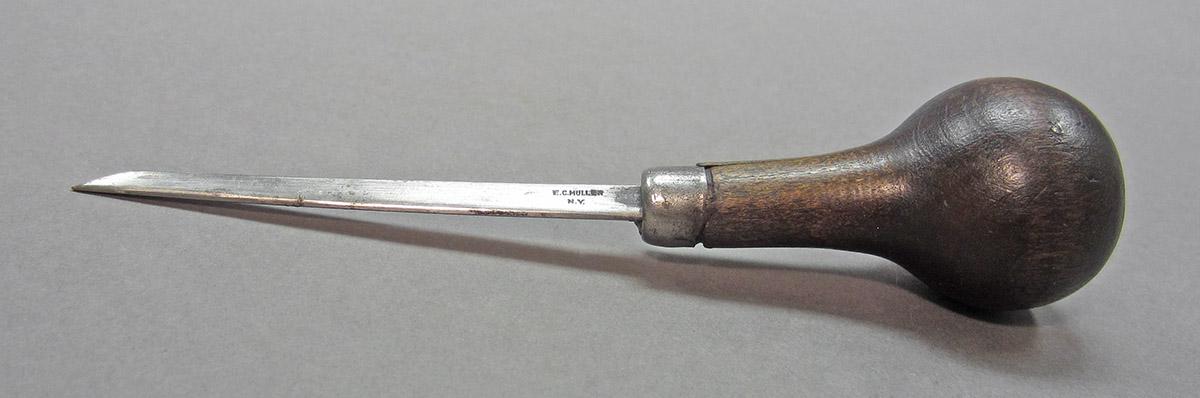 1961.0493.029, Burin, side 1