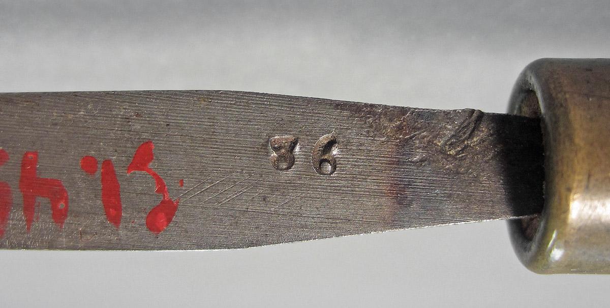 1961.0493.030, Burin, mark