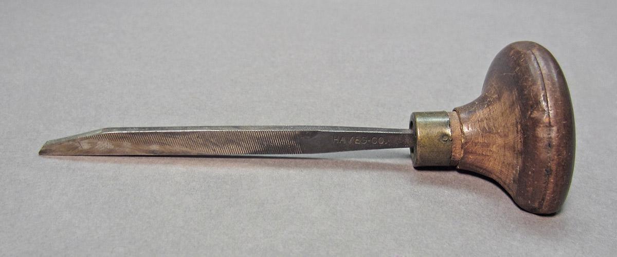 1961.0493.033, Burin, side 2