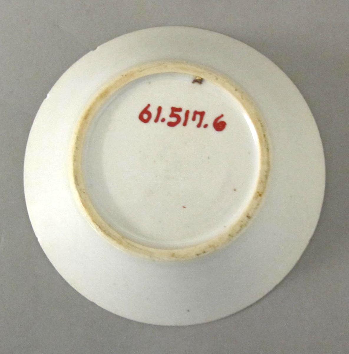 1961.0517.006 Porcelain saucer underside