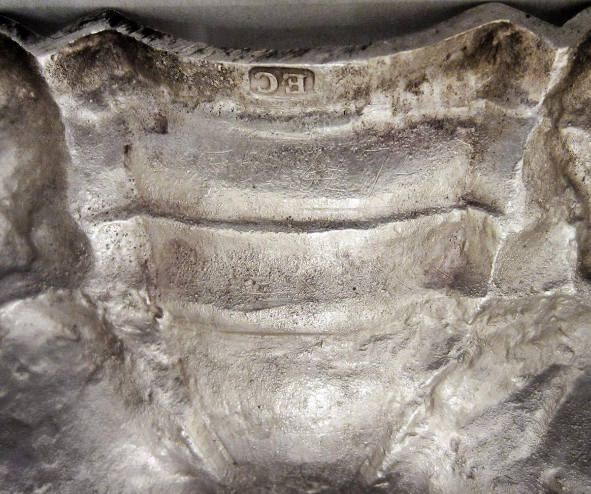 1961.0546.002 A Candlestick, inscription