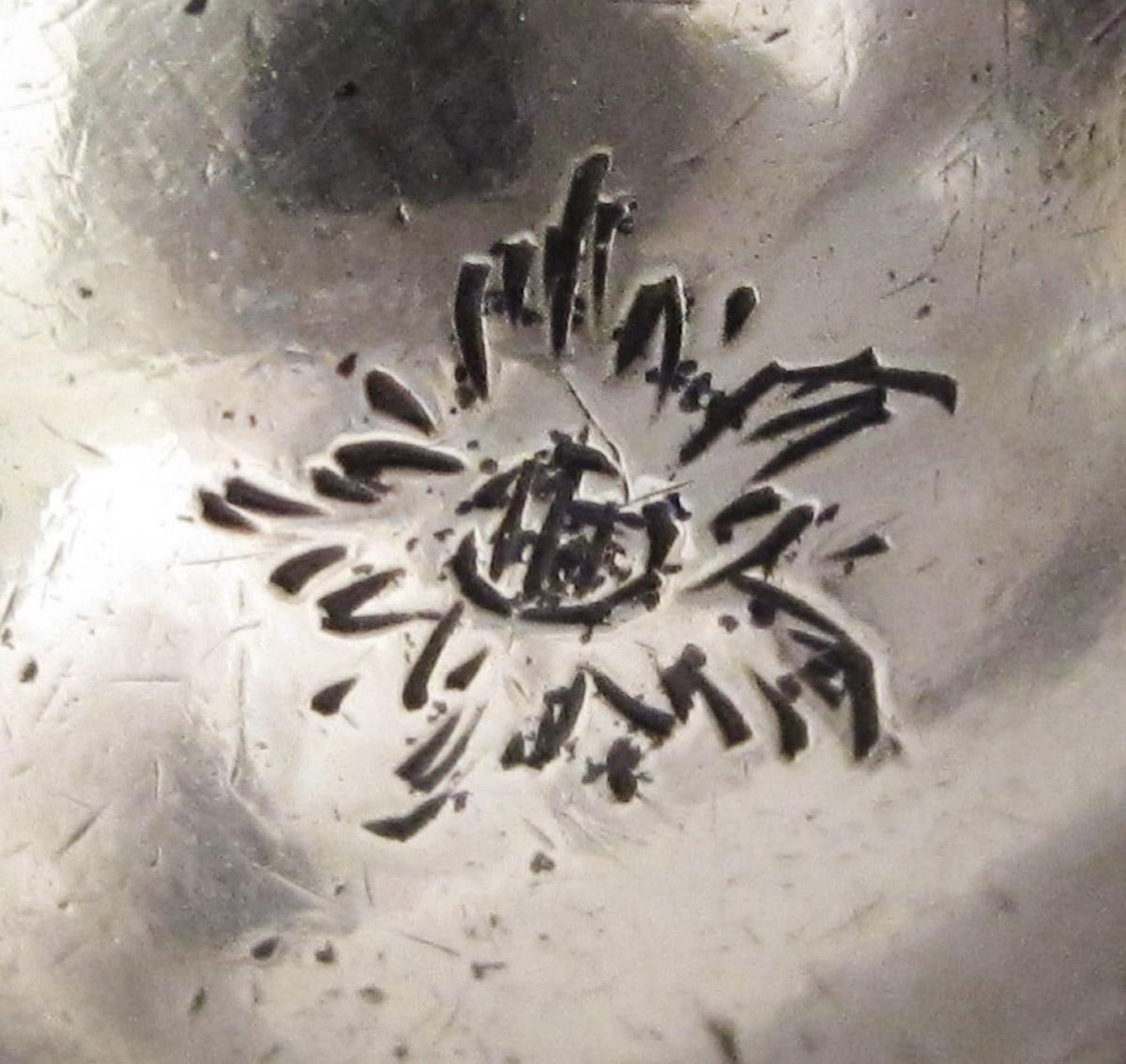1961.0558 Ladle, engraving