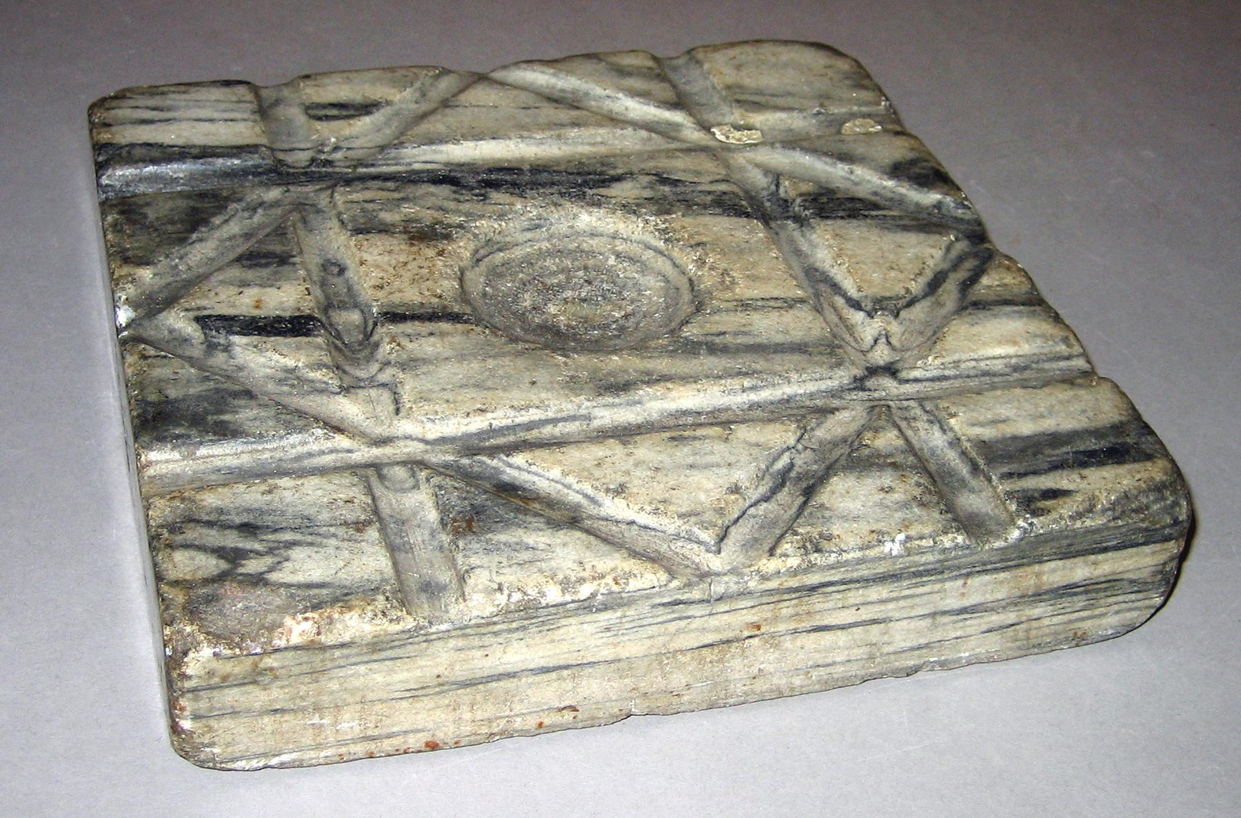 1961.0561.002 Tong stone