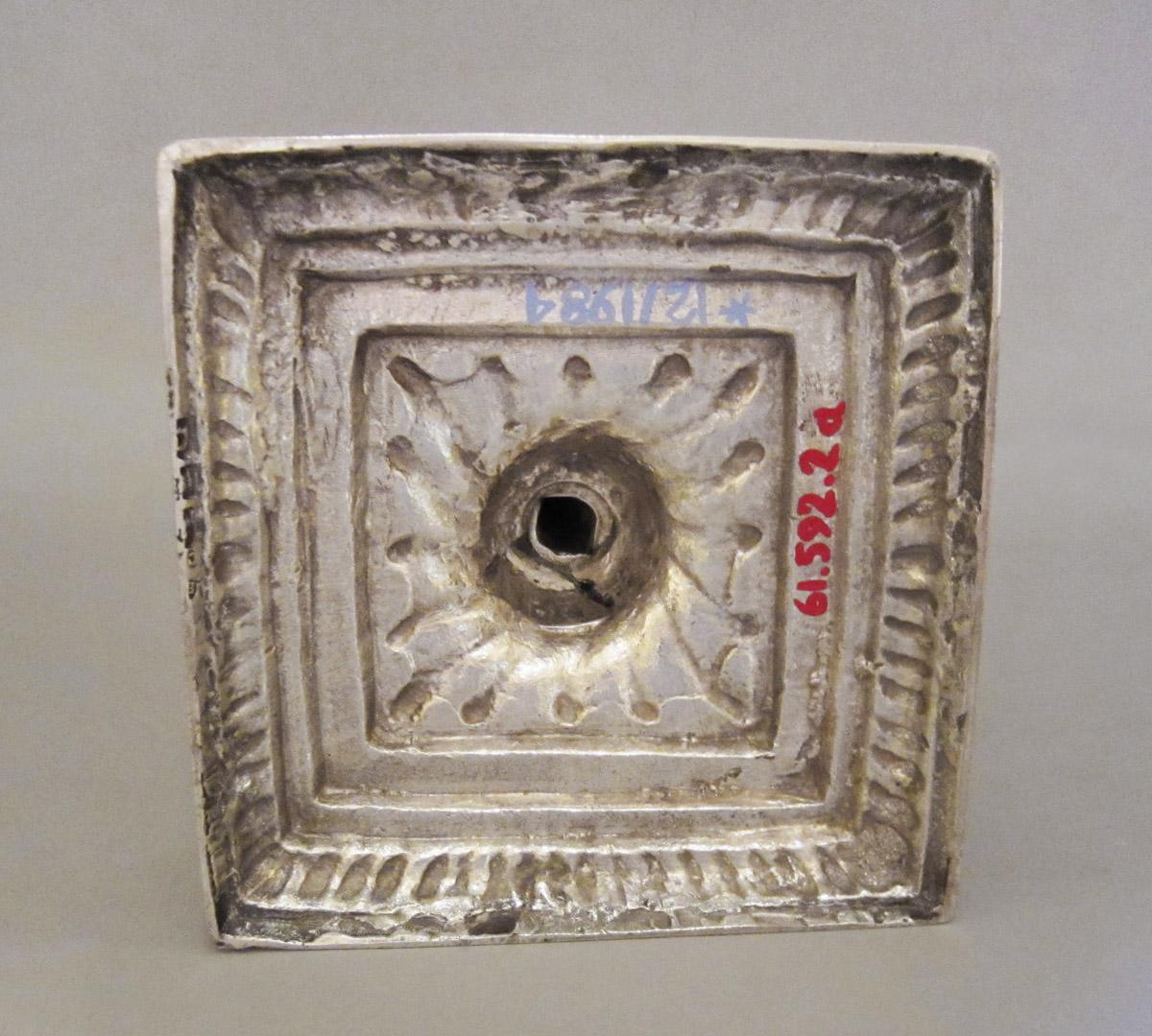 1961.0592.002 A Candelabrum, underside