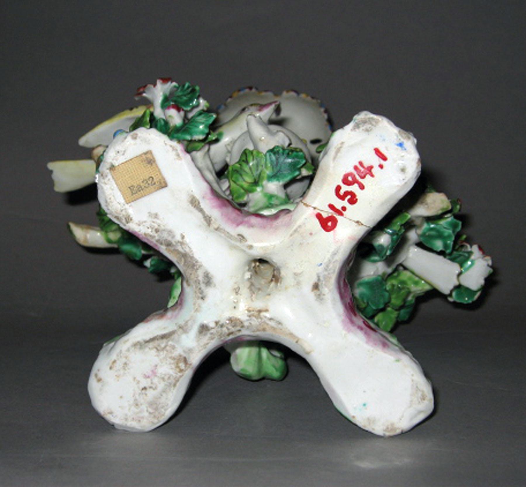 1961.0594.001 Bow porcelain candlestick (underside)