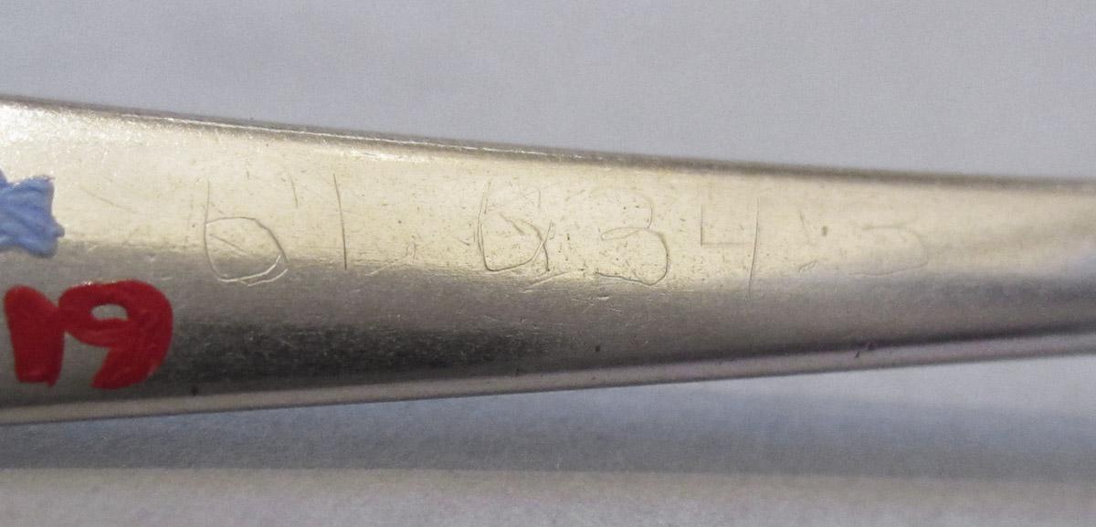 1961.0634.003 Spoon, inscription