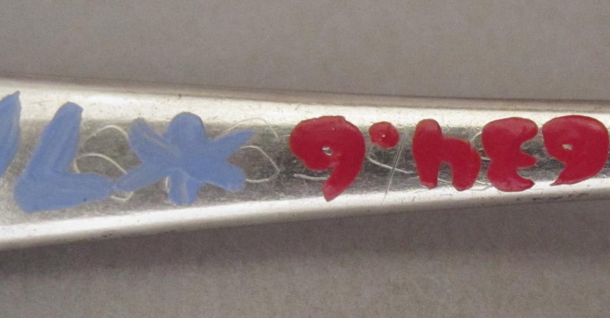 1961.0634.006 Spoon, inscription