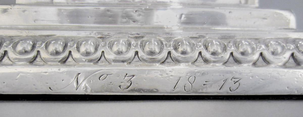 1961.0649.001 A Candlestick, inscription 1
