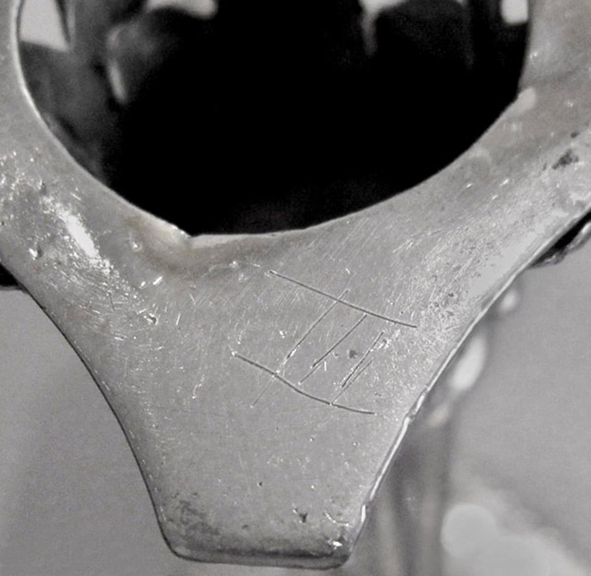 1961.0649.005 A Candlestick, inscription 2
