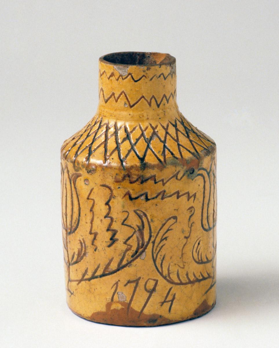 1952.0055 PA Sgraffito slipware tea canister (1794 side)