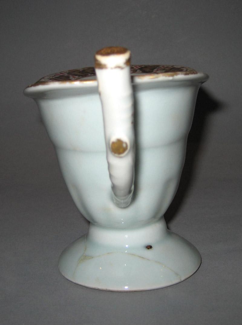 1961.0673.002 Cream or milk jug handle