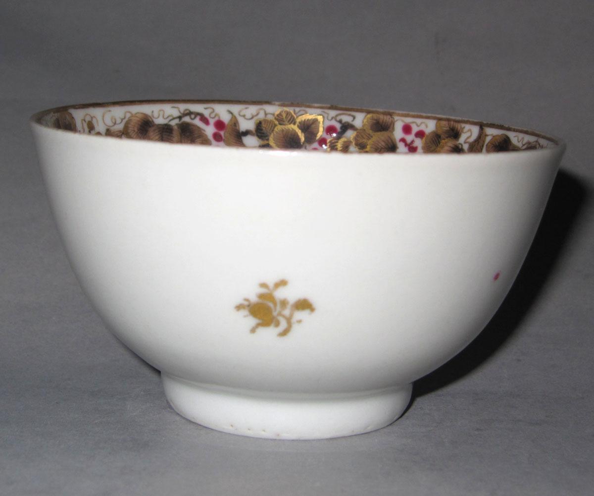 1961.0673.032 Porcelain teabowl face 2