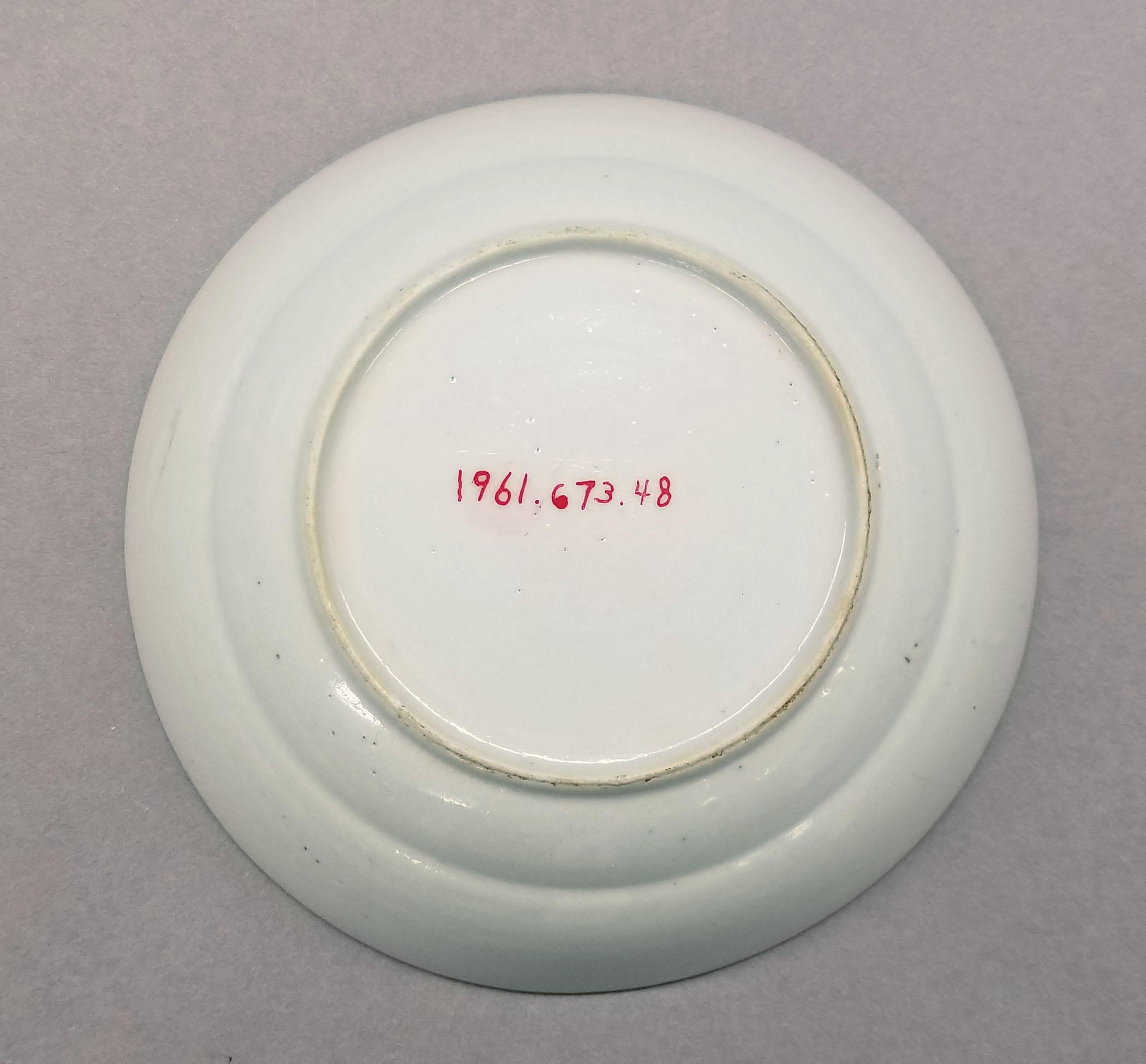 1961.0673.048 Saucer underside