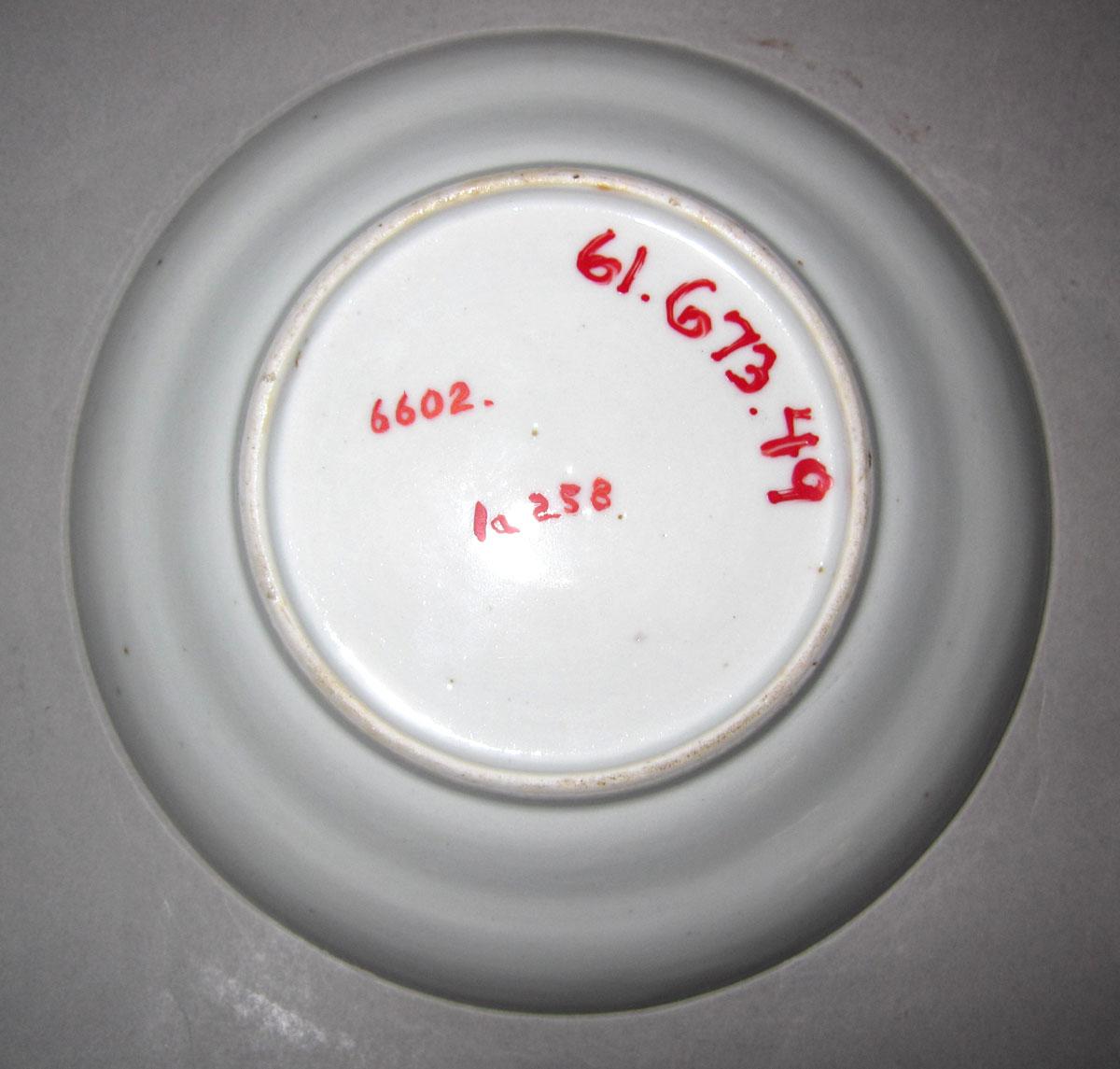 1961.0673.049 Porcelain saucer underside
